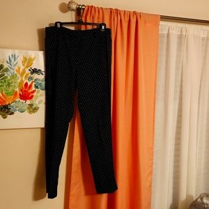 A pair of black and white  polka-dot pants size 10 by Emma&Olivia for $13.